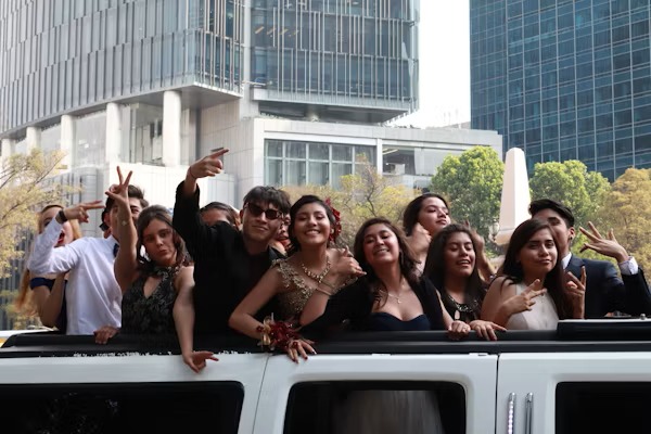 Happy customers enjoying luxury limousine service from transportlinehub.pro during a memorable event.