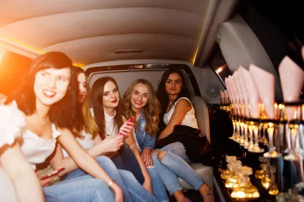 Luxury limousine service by transportlinehub.pro showcasing satisfied customers enjoying memorable experiences.