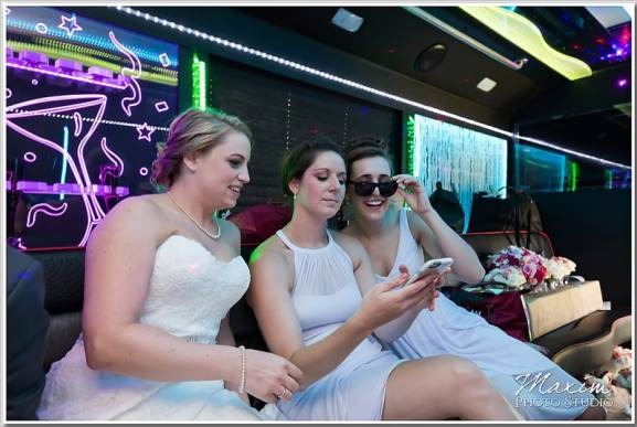 Happy customers enjoying luxury limousine service from transportlinehub.pro during a memorable event.